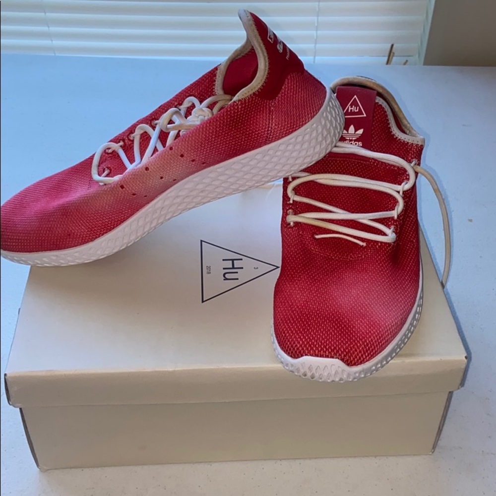 Red and white adidas Hu